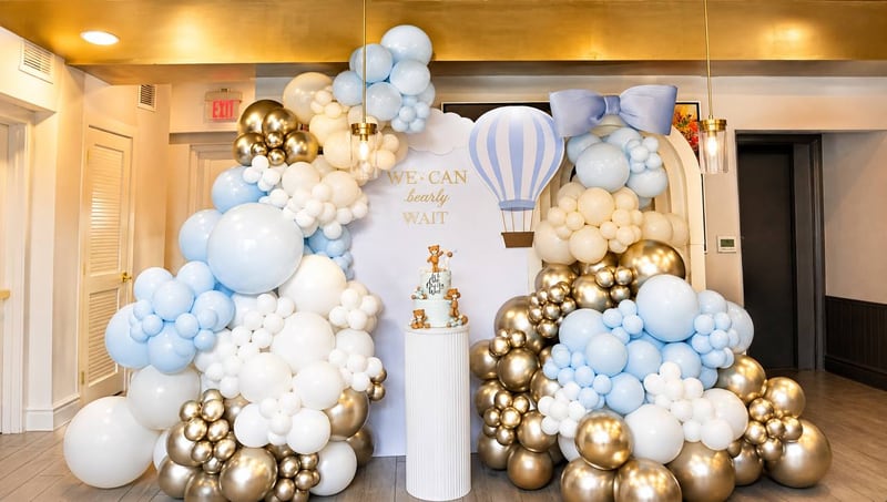 Light blue, white and gold balloon clouds with a hot air balloon cutout